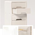 Meuble compact pour rangement enfant avec tiroirs et compartiments spacieux.